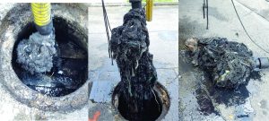 Imagen representativa del mal manejo de las redes de alcantarillado, arrojando residuos sólidos