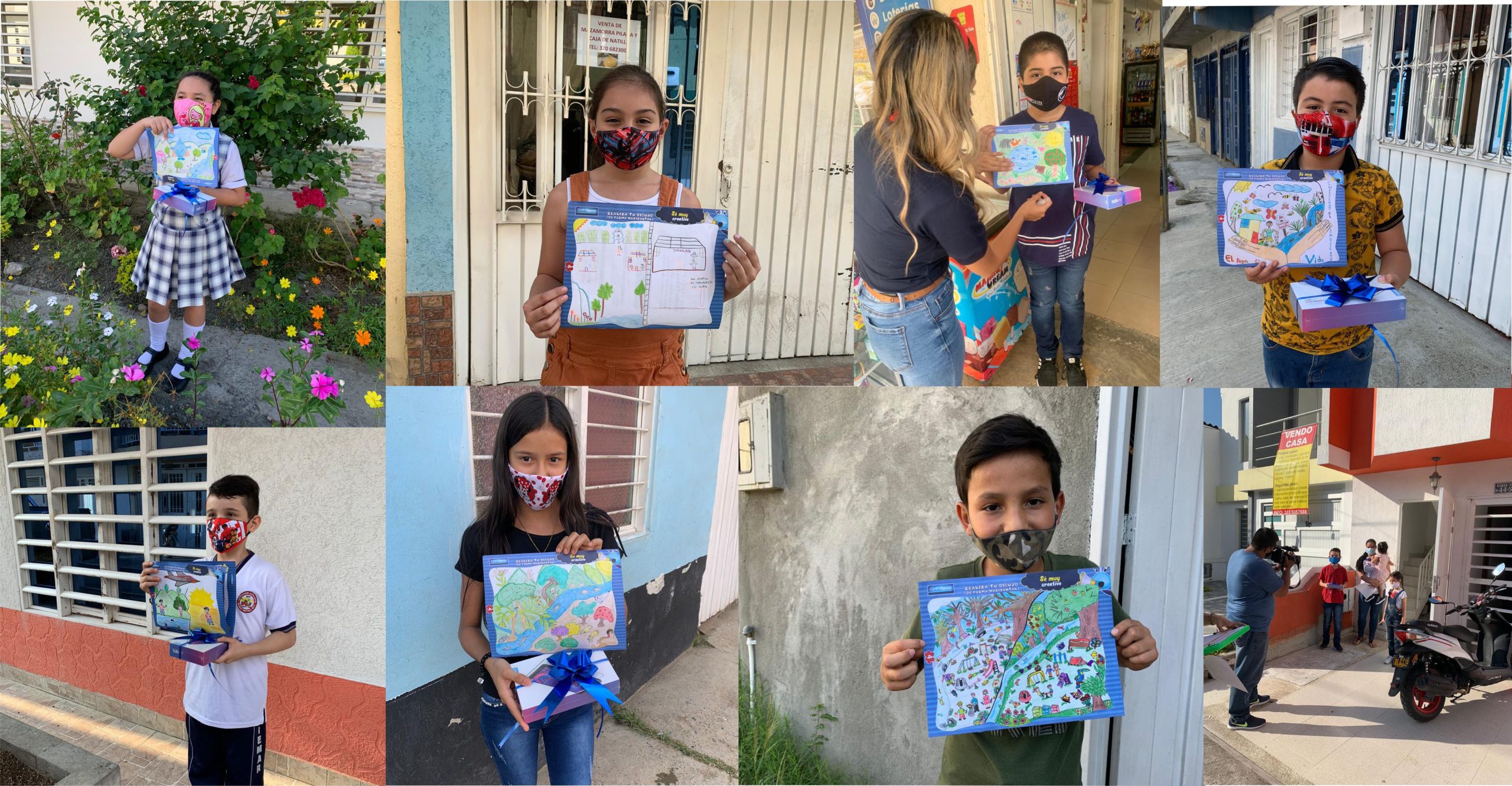 personal de centroaguas entregando premios a los niños ganadores del concurso de pintura infantil Imagen representativa del persona de centroaguas entregando premios a los niños ganadores del concurso de pintura infantil